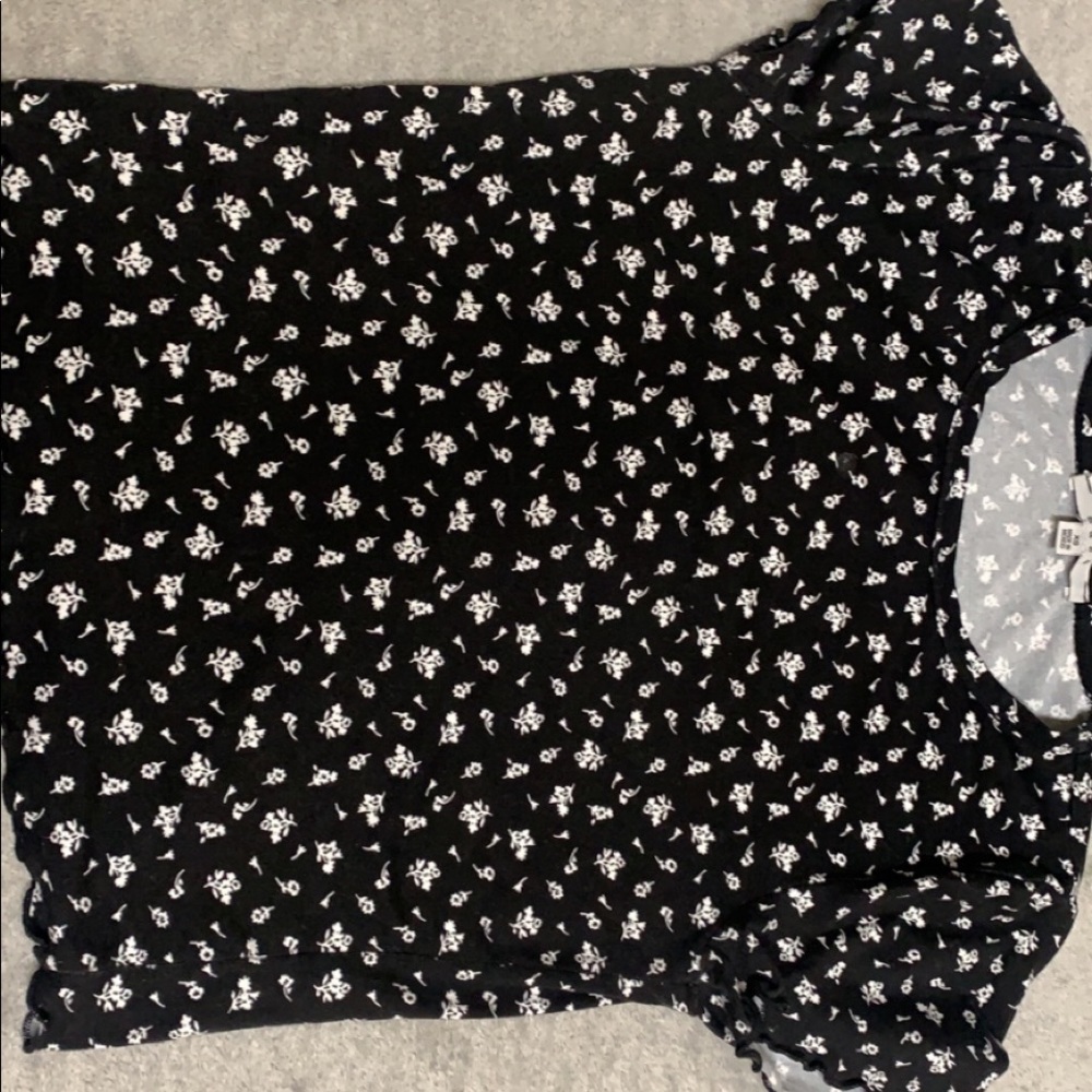 A black and white flower crop top